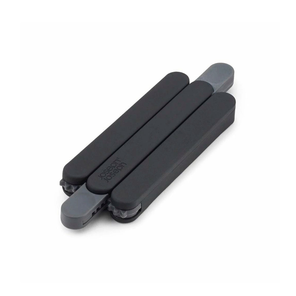 Apoya fuentes triangular negro