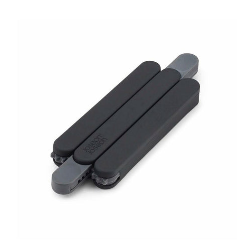 Apoya fuentes triangular negro