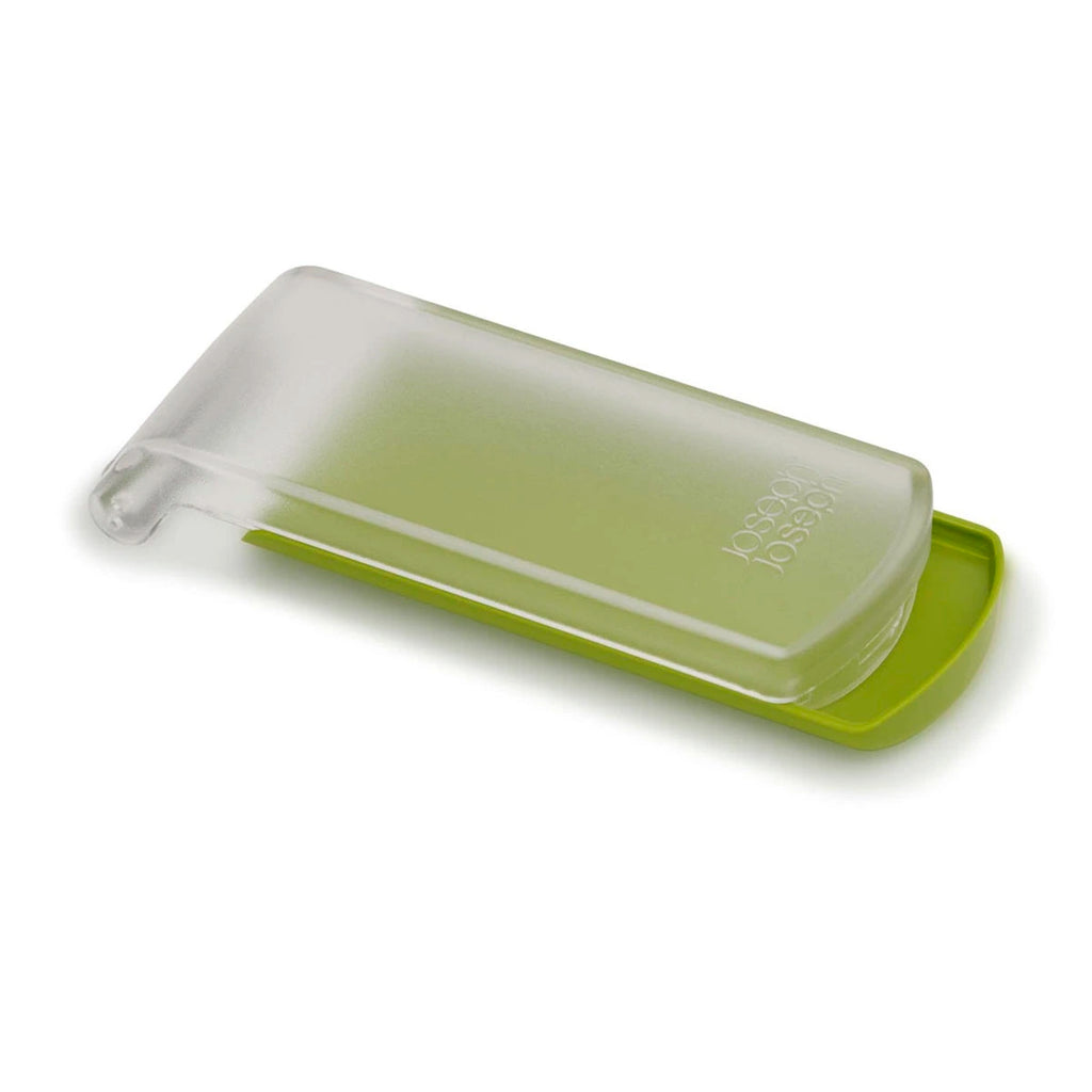 Pelador con depósito verde