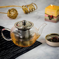Tetera de vidrio borosilicato con tapa e infusor