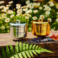 Vela Serenity naranja persa y cassis