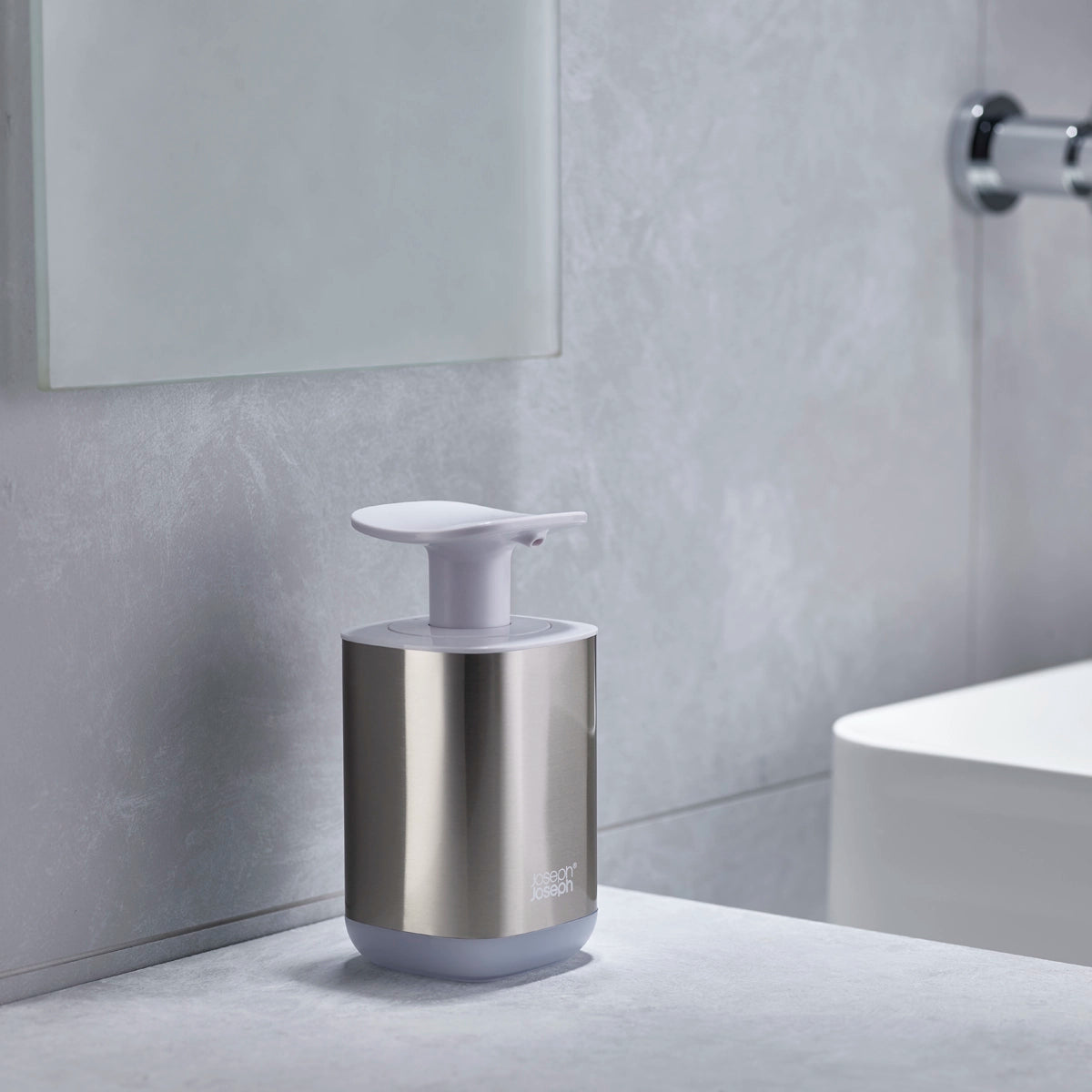Dispensador de jabón blanco en acero inoxidable