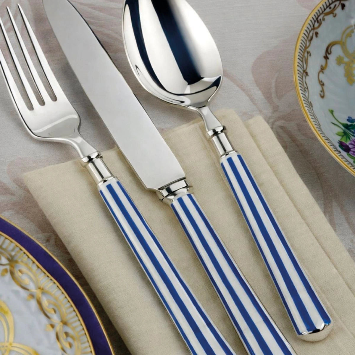 Set de 24 cubiertos mango a rayas azul y blanco
